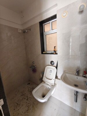 Bathroom in 1 BHK Apartment at PuranikCity Building No D1 D2 & H Chs Ltd, Ghodbunder Road – for Rent