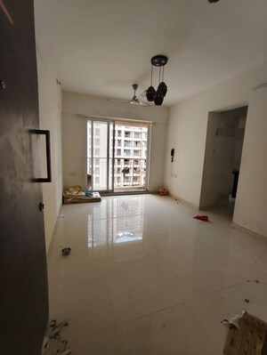 Living Room in 1 BHK Apartment at PuranikCity Building No D1 D2 & H Chs Ltd, Ghodbunder Road – for Rent