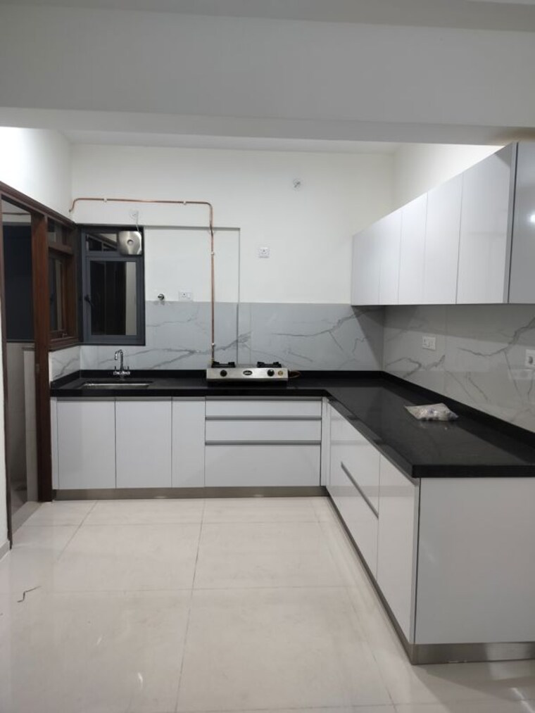 Kitchen, amanora-elivate-tower 2 Bedroom 863 Sq.Ft. Apartment In Hadapsar Pune 10249158
