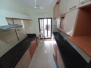 Kitchen in 2 BHK Apartment at Goyal Lakshchandi Heights, Goregaon East – for Rent