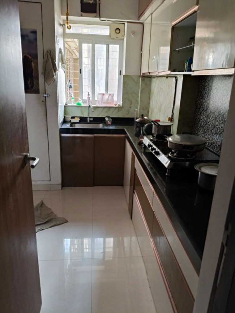 Kitchen, lodha-amara 2 Bedroom 672 Sq.Ft. Apartment In Kolshet Road Thane 10249189