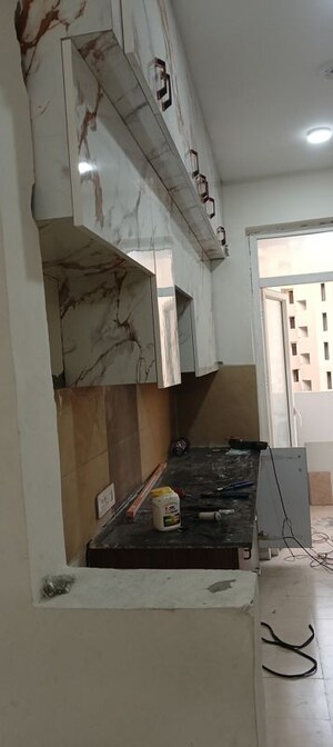 Kitchen in 3 BHK Apartment at Amrapali Heartbeat City, Sector 107 – for Rent