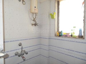 Bathroom in 1 BHK Apartment at Azad CHS, Goregaon East – for Rent