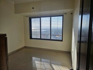 Room in 2 BHK Apartment at Ameya CHS Seawoods, Seawoods Sector 44 – for Sale