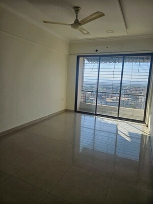 Room in 2 BHK Apartment at Ameya CHS Seawoods, Seawoods Sector 44 – for Sale