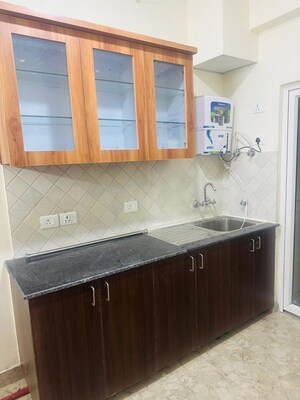 Kitchen in 1 BHK Apartment at Gaur City Mall, Sector 4 Greater Noida – for Rent