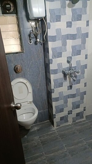 Bathroom in 3 BHK Apartment at SSD Goregaon Pearl CHSL, Goregaon West – for Rent