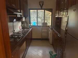 Kitchen in 2 BHK Apartment at Bajaj Wits End, Bandra West – for Rent