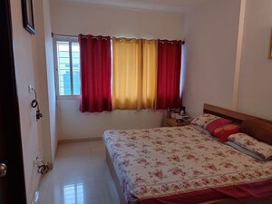 Bedroom in 3 BHK Apartment at Pramuk Aqua Heights, Electronic City Phase I – for Rent