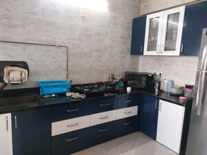 Kitchen in 3 BHK Apartment at Janki Rainbow Apartments, Baner – for Rent
