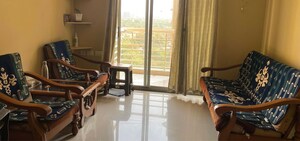 Living Room in 2 BHK Apartment at Adani The Meadows, Near Vaishno Devi Circle On Sg Highway – for Rent