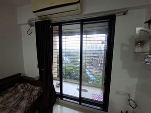 Room in 1 BHK Apartment at Raunak Bliss B1, Ghodbunder Road – for Rent
