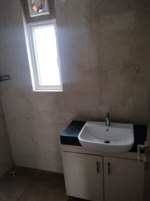 Bathroom in 2.5 BHK Builder Floor at Smart World Gems, Sector 89 – for Rent