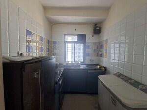 Kitchen in 1 BHK Apartment at Haware Dahlia, Kasarvadavali – for Rent