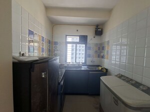 Kitchen in 1 BHK Apartment at Raunak Delight, Owale – for Rent