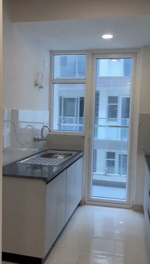 Kitchen in 2 BHK Apartment at Nimbus Express Park View - II, Chi V Greater Noida – for Rent