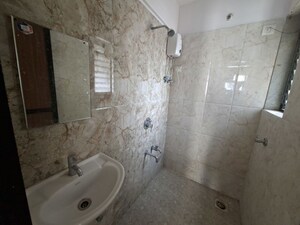 Bathroom in 1 BHK Apartment at Raunak Delight, Owale – for Rent