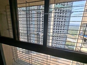 Room in 1 BHK Apartment at Raunak Delight, Owale – for Rent