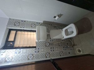 Kitchen in 1 BHK Apartment at Raunak Delight, Owale – for Rent