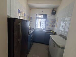 Kitchen in 1 BHK Apartment at Raunak Delight, Owale – for Rent