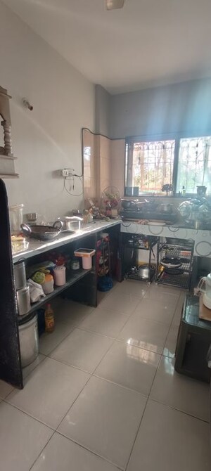 Kitchen in 1.5 BHK Apartment at Aashiyana Triveni, Bopodi – for Rent