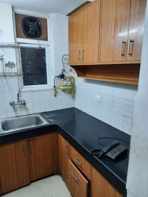 Kitchen in 1 BHK Apartment at Aditya Celebrity Homes, Sector 76 – for Rent
