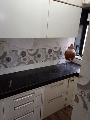 Kitchen in 1.5 BHK Apartment at Anmol CHS Dadar, Dadar West – for Rent