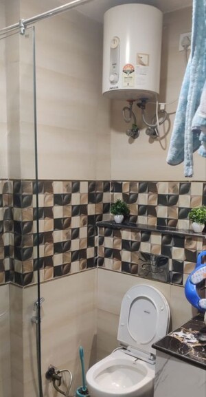 Bathroom in 2 BHK Apartment at Raheja Vedaanta, Sector 108 – for Sale