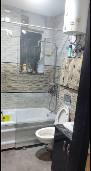 Bathroom in 2 BHK Apartment at Raheja Vedaanta, Sector 108 – for Sale
