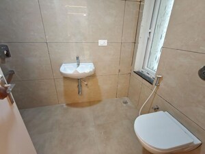 Bathroom in 3 BHK Apartment at Ramky Towers, Gachibowli – for Rent
