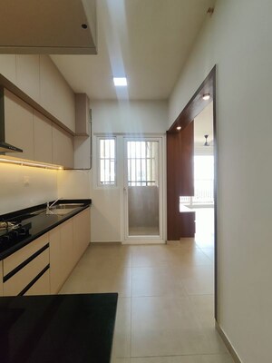 Kitchen in  Apartment at Bhartiya Nikoo Homes Phase 2, Thanisandra Main Road – for Rent