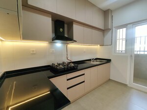 Kitchen in  Apartment at Bhartiya Nikoo Homes Phase 2, Thanisandra Main Road – for Rent