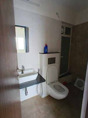 Bathroom in 1 BHK Apartment at Omkar Signet, Malad East – for Rent