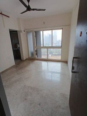 Living Room in 1 BHK Apartment at Omkar Signet, Malad East – for Rent