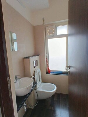 Bathroom in 1 BHK Apartment at Omkar Signet, Malad East – for Rent
