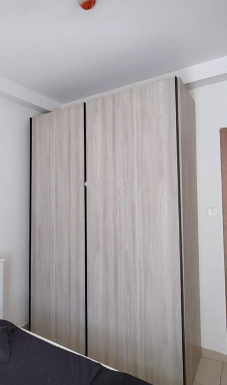 Bedroom, bhartiya-nikoo-homes 2.5 Bedroom 945 Sq.Ft. Apartment In Thanisandra Main Road Bangalore 10250319