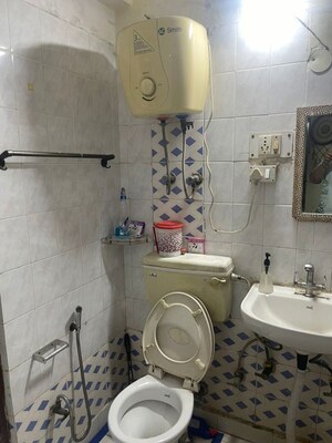 Bathroom in 3 BHK Apartment at Shivalik Colony – for Rent