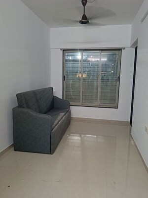 Living Room in 1 BHK Apartment at City View Building, Worli – for Rent