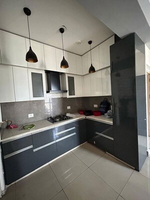 Kitchen in 2 BHK Apartment at Panchsheel Greens, Sector 16 Greater Noida – for Rent