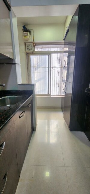 Kitchen in 2 BHK Apartment at Rizvi Oak, Malad East – for Rent