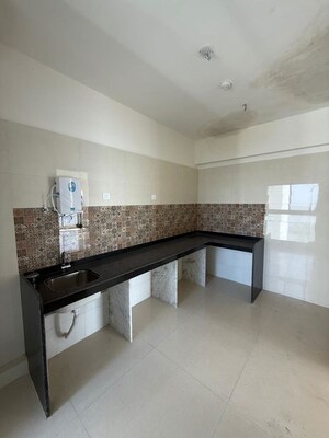 Kitchen in 2 BHK Builder Floor at Shree Krishna Bhoomi, Naigaon East – for Sale