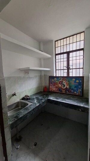 Kitchen in 1.5 BHK Apartment at Sector 10 Greater Noida – for Sale