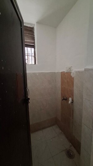 Bathroom in 1.5 BHK Apartment at Sector 10 Greater Noida – for Sale