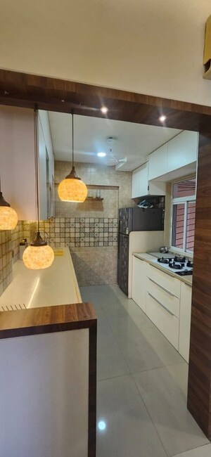 Kitchen in 2 BHK Apartment at Siddhi Highland Park Phase 2, Kapur Bawdi – for Rent