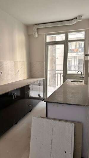 Kitchen in 2 BHK Apartment at Aims Greens Avenue, Sector 4 Greater Noida – for Rent