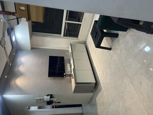 Living Room in 1 BHK Apartment at Lodha Amara, Kolshet Road – for Sale