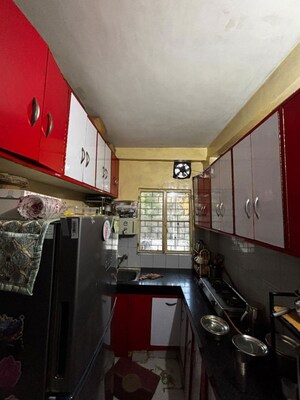 Kitchen in 1 BHK Apartment at UPAVP Brahmputra Enclave, Siddharth Vihar – for Sale