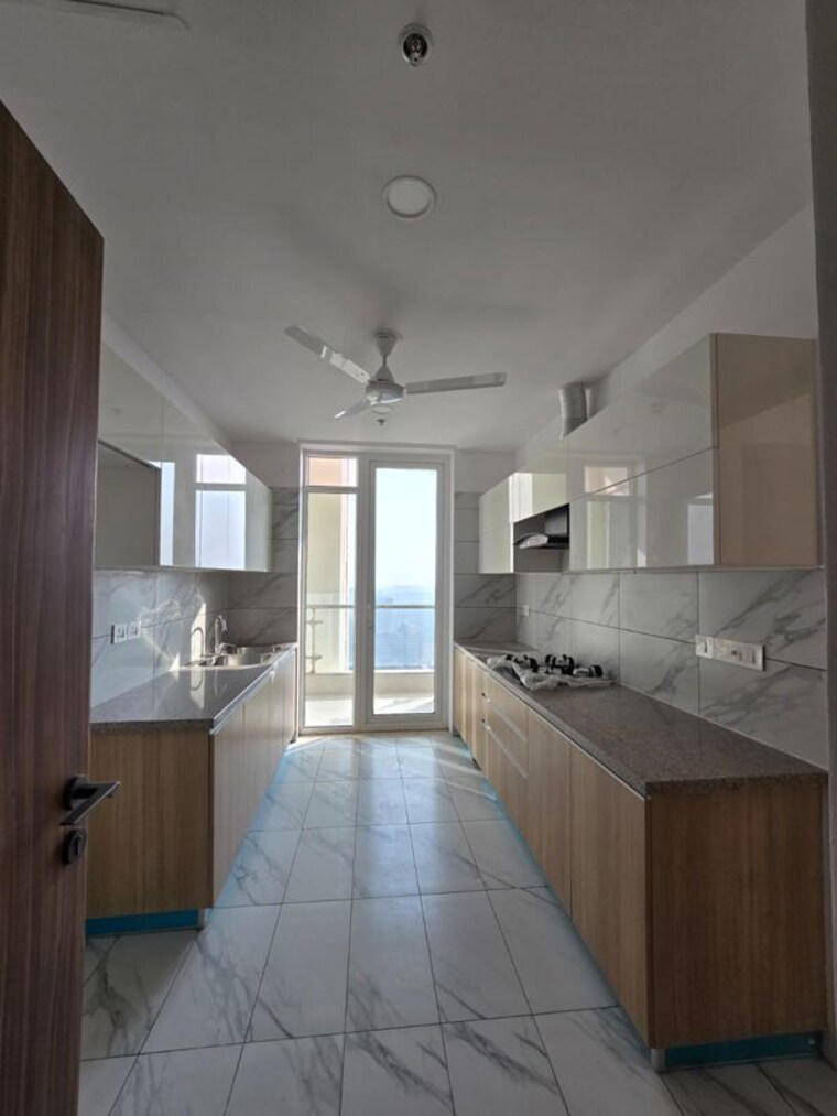 Kitchen, puri-the-aravallis 4 Bedroom 2750 Sq.Ft. Apartment In Sector 61 Gurgaon 10250720