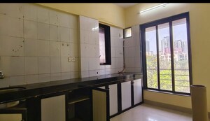 Kitchen in 2 BHK Apartment at J P Residency, Malad West – for Rent