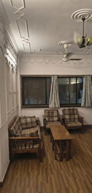 Living Room in 2 BHK Apartment at Airport Area Juhu – for Rent
